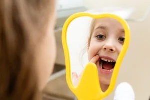 baby girl looking at herself in the mirror baby girl looking at herself in the mirror